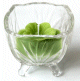 Bougie parfumee sous forme de fleur de couleur vert dans un joli recipient en verre